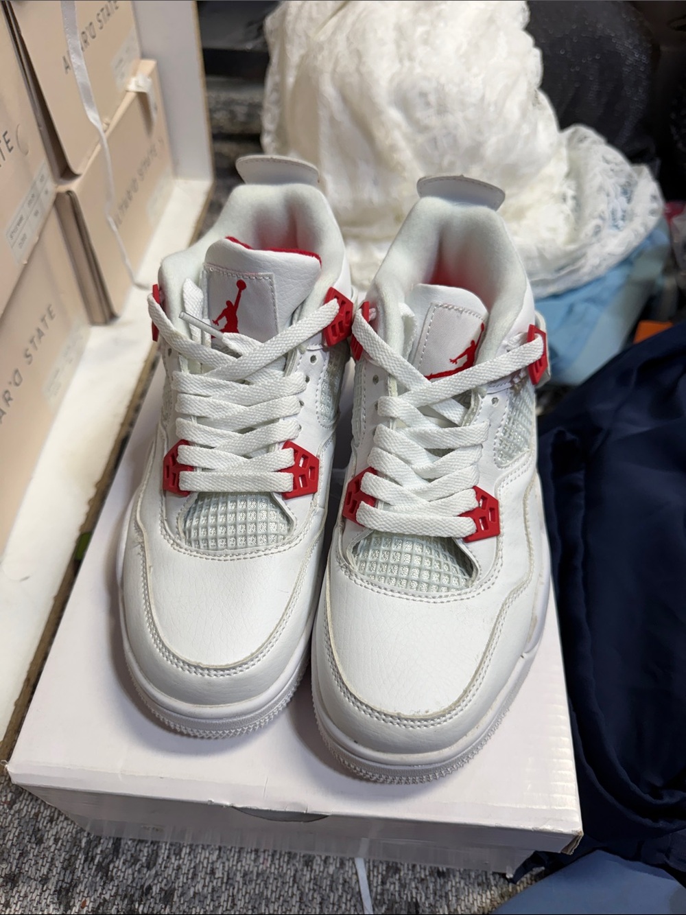 Nike Jordan 4 White and Red Retro Basketball Sneakers - Picture 3 of 6